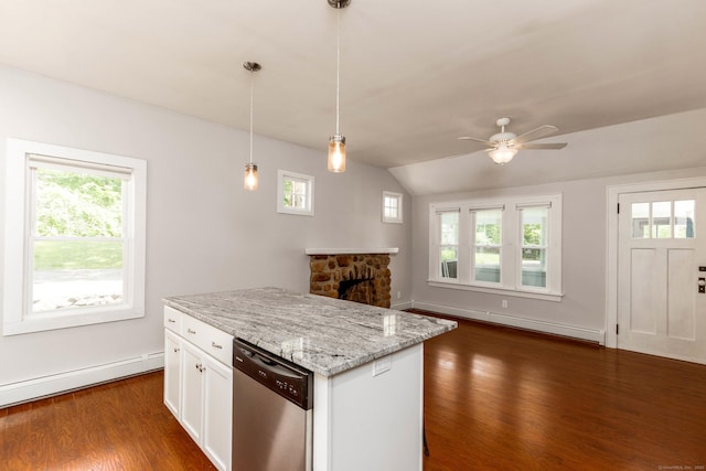 15 Seneca Rd, Middlefield, CT 06455 - kitchen with stainless steel dishwasher, a baseboard radiator, a stone fireplace, dark wood-style floors, and white cabinetry