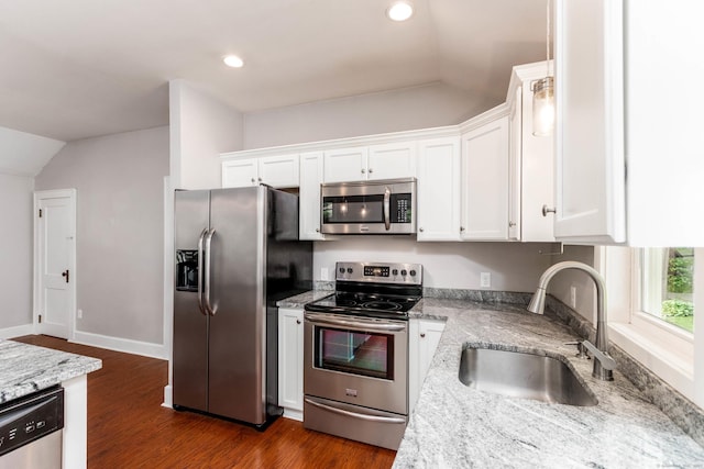 15 Seneca Rd, Middlefield, CT 06455 - kitchen featuring stainless steel appliances, a sink, lofted ceiling, white cabinets, and dark wood-style floors