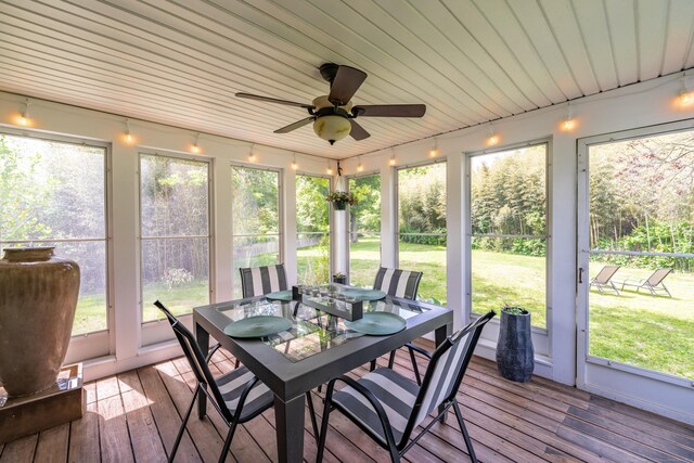97 Spring Wood Ln, Bloomfield, CT 06002 - sunroom with a ceiling fan and outdoor dining space