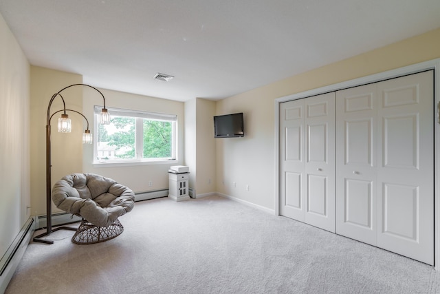 97 Spring Wood Ln, Bloomfield, CT 06002 - living area featuring carpet, a baseboard radiator, and baseboards
