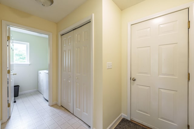 97 Spring Wood Ln, Bloomfield, CT 06002 - laundry area featuring baseboards