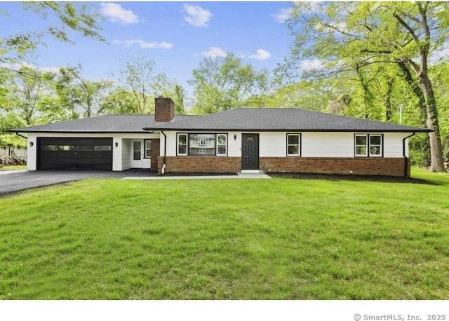 53 Cassella Dr, Hamden, CT 06514 - ranch-style home featuring a chimney, brick siding, a garage, asphalt driveway, and a front yard
