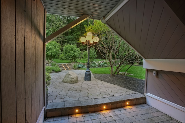 227 Dublin Hill Rd, Southbury, CT 06488 - doorway featuring wooden walls, lofted ceiling, and a chandelier