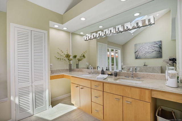 227 Dublin Hill Rd, Southbury, CT 06488 - full bathroom featuring a closet, vaulted ceiling, recessed lighting, double vanity, and tile patterned floors