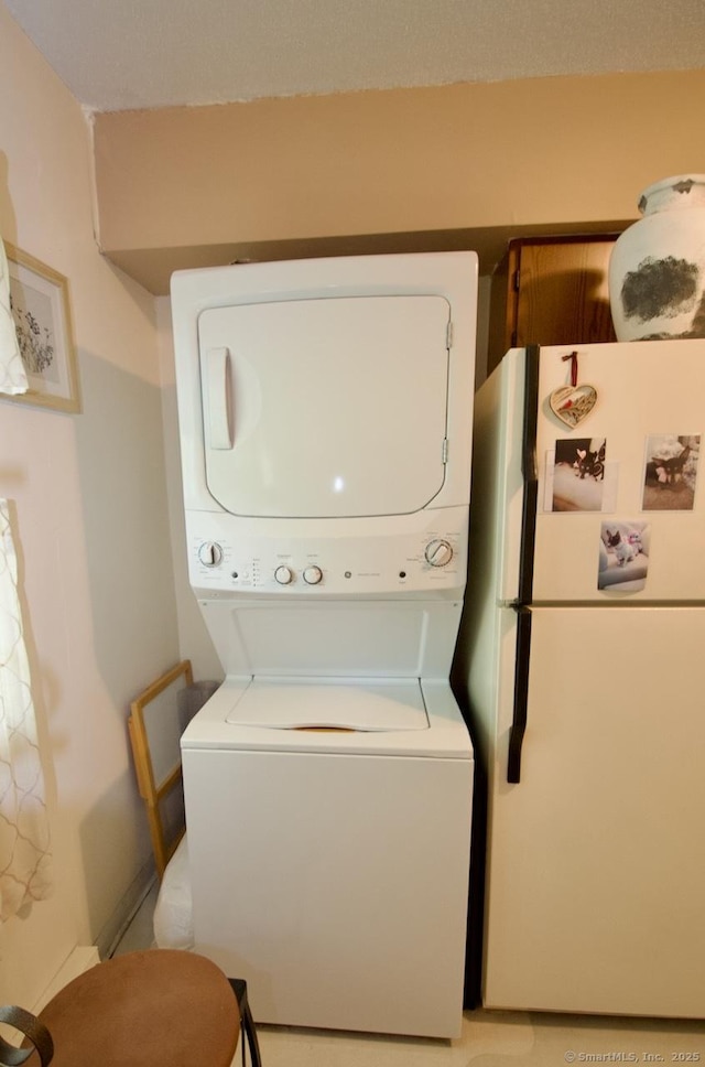 35 Mountain Village Rd Unit 15, Waterbury, CT 06706 - laundry room featuring stacked washer / dryer