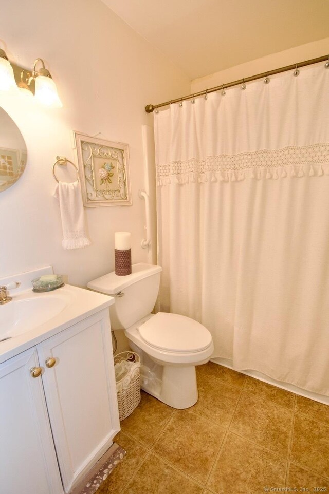 35 Mountain Village Rd Unit 15, Waterbury, CT 06706 - bathroom featuring vanity, toilet, tile patterned flooring, and a shower with shower curtain