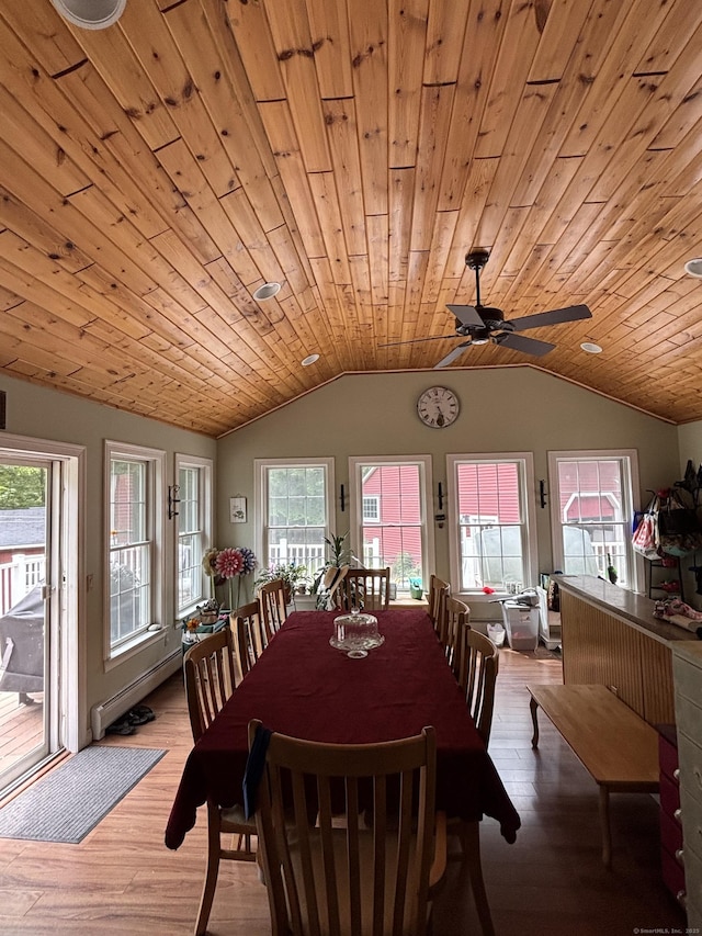 676 Deep River Rd, Colchester, CT 06415 - dining area with vaulted ceiling, wooden ceiling, wood finished floors, plenty of natural light, and baseboard heating