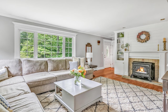 91 Bart Rd, Monroe, CT 06468 - living area with healthy amount of natural light, crown molding, light wood-style floors, and a fireplace