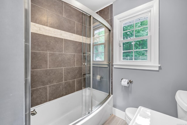 91 Bart Rd, Monroe, CT 06468 - bathroom featuring toilet, bath / shower combo with glass door, and baseboards