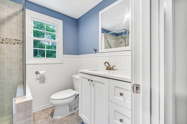 91 Bart Rd, Monroe, CT 06468 - full bath with toilet, vanity, tile patterned floors, a wainscoted wall, and tiled shower