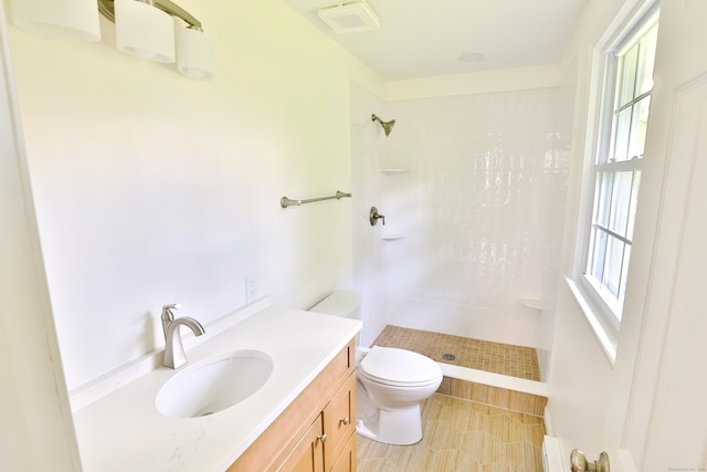 792 Cornwall Ave, Cheshire, CT 06410 - full bathroom featuring toilet, a tile shower, plenty of natural light, and vanity