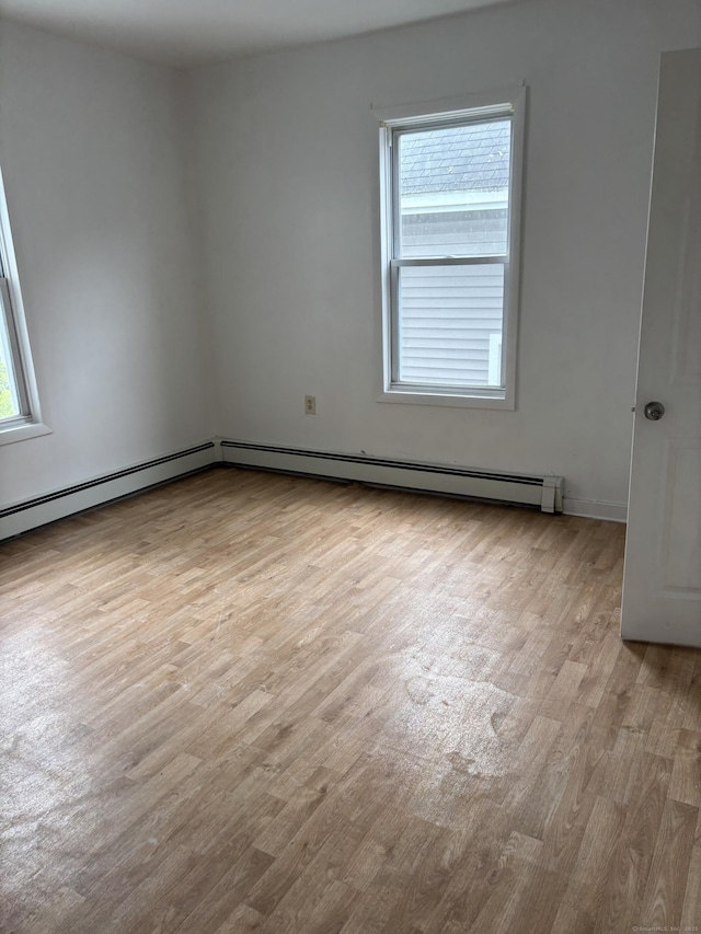 70 W St, New London, CT 06320 - spare room featuring wood finished floors
