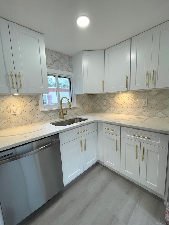 1042 Poquonnock Rd Lot 3, Groton, CT 06340 - kitchen featuring stainless steel dishwasher, a sink, white cabinetry, light wood finished floors, and light stone countertops