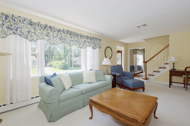 110 Cottage St, Trumbull, CT 06611 - carpeted living area with plenty of natural light, stairway, and baseboard heating