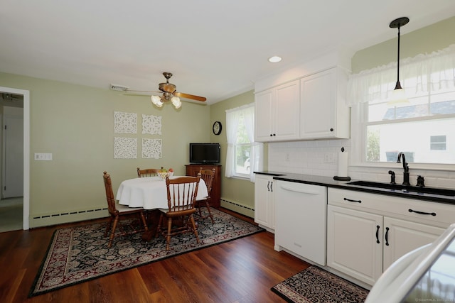 110 Cottage St, Trumbull, CT 06611 - kitchen featuring a baseboard heating unit, dishwasher, dark countertops, plenty of natural light, and recessed lighting
