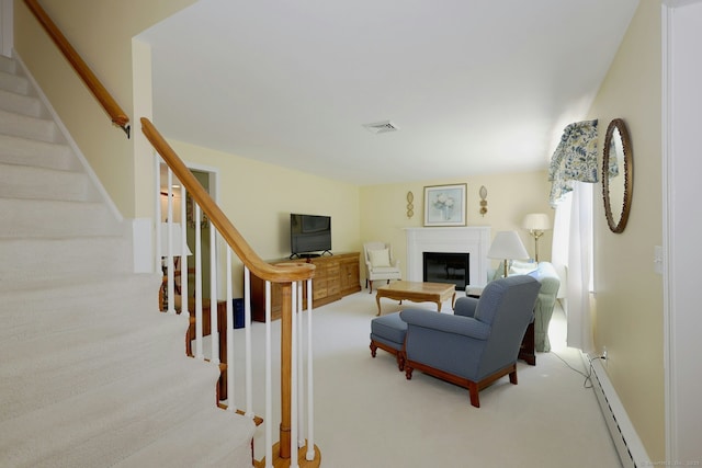 110 Cottage St, Trumbull, CT 06611 - living area featuring stairs, a fireplace, a baseboard radiator, and carpet flooring