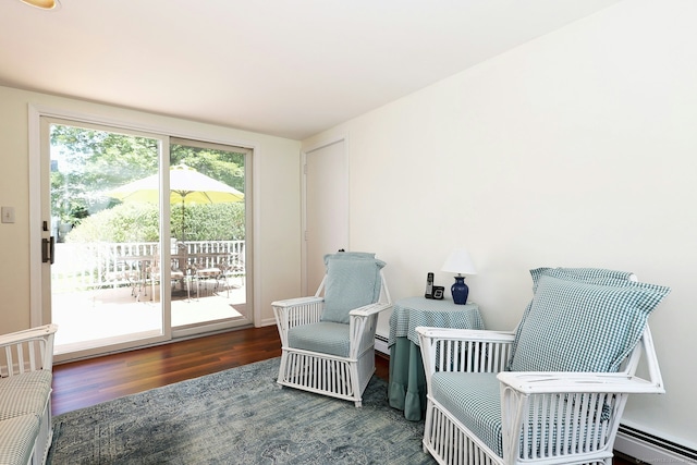 110 Cottage St, Trumbull, CT 06611 - living area featuring wood finished floors and baseboard heating