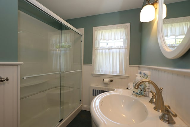 110 Cottage St, Trumbull, CT 06611 - full bath with a stall shower, a sink, and a wainscoted wall
