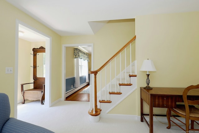 110 Cottage St, Trumbull, CT 06611 - stairway featuring baseboard heating, carpet floors, and baseboards