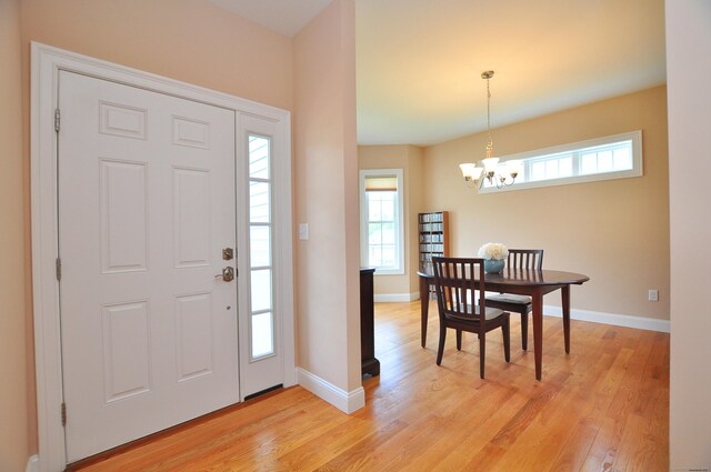221 Scenic Dr Unit 221, Berlin, CT 06037 - foyer entrance featuring light wood-type flooring and a chandelier