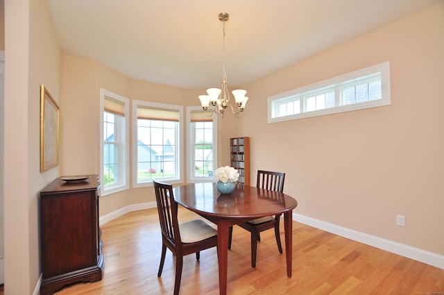221 Scenic Dr Unit 221, Berlin, CT 06037 - dining space featuring a chandelier and light wood-style flooring