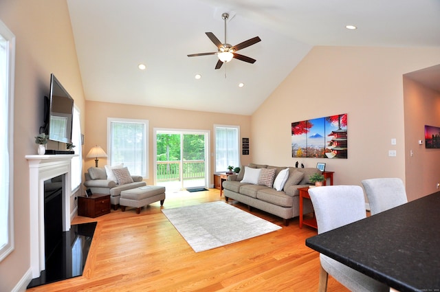 221 Scenic Dr Unit 221, Berlin, CT 06037 - living area with high vaulted ceiling, a ceiling fan, light wood-type flooring, a fireplace, and recessed lighting