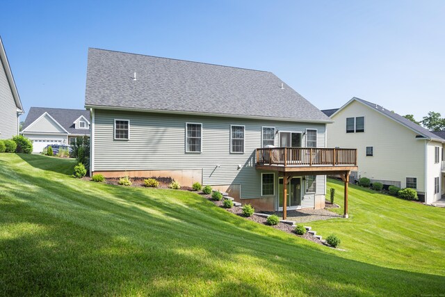 221 Scenic Dr Unit 221, Berlin, CT 06037 - back of property with a wooden deck and a lawn