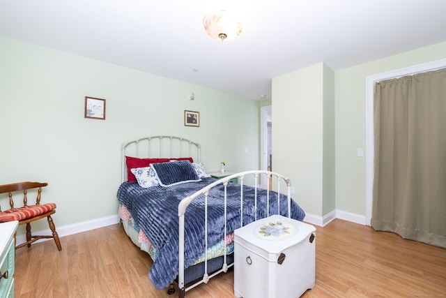237 Fern St Apt 206W, West Hartford, CT 06119 - bedroom with light wood-style floors and baseboards