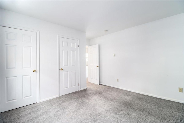 12 Terrace Pl Unit 12, New Milford, CT 06776 - unfurnished bedroom with carpet floors and baseboards