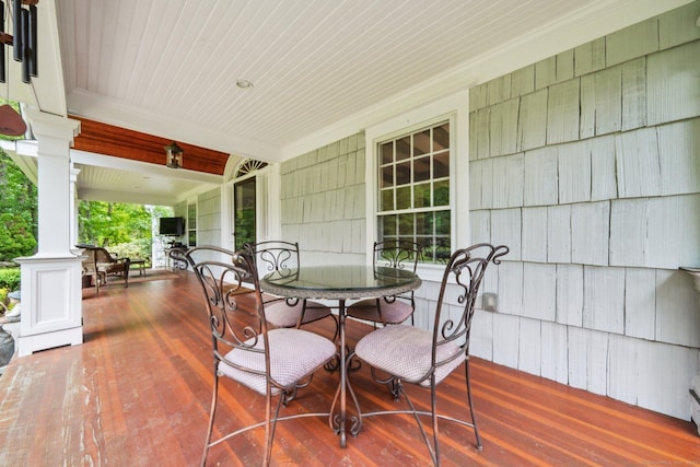 6 Downe Ln, Wilton, CT 06897 - wooden porch featuring outdoor dining space