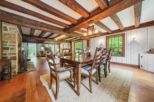 6 Downe Ln, Wilton, CT 06897 - dining space featuring wood-type flooring, beam ceiling, healthy amount of natural light, and a chandelier
