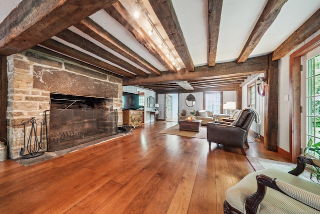 6 Downe Ln, Wilton, CT 06897 - living room featuring hardwood / wood-style floors, beam ceiling, and a high end fireplace