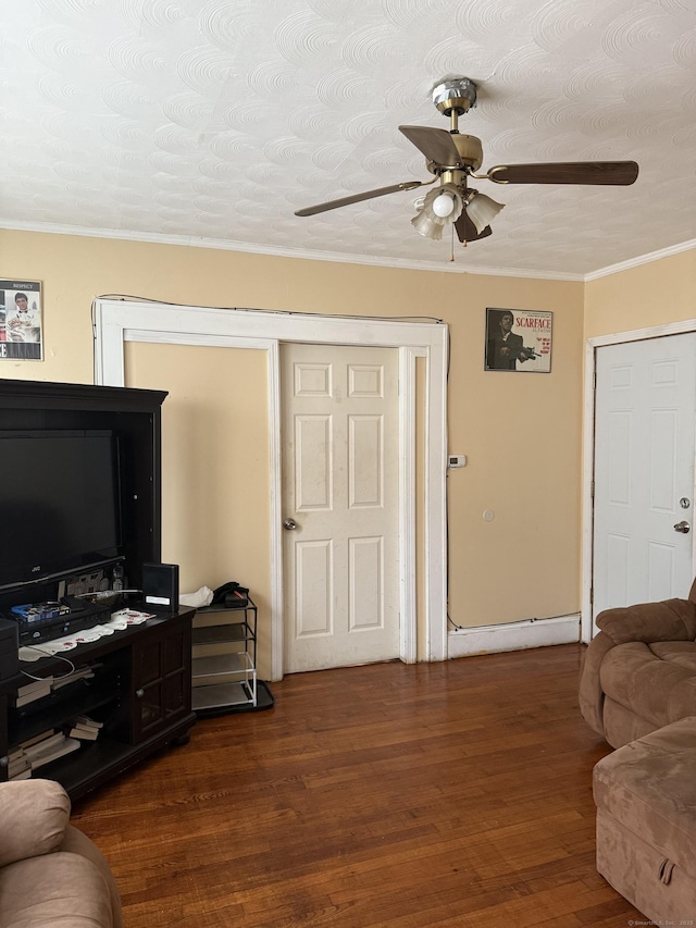 290 Ridgefield Ave, Bridgeport, CT 06610 - living room featuring a ceiling fan, dark wood-style floors, and ornamental molding
