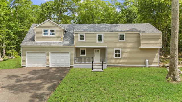 73 Nedobity Rd, Haddam, CT 06441 - view of front of house featuring asphalt driveway, a front lawn, a shingled roof, and a garage