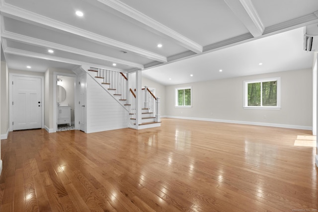 73 Nedobity Rd, Haddam, CT 06441 - unfurnished living room featuring stairs, light wood-type flooring, beam ceiling, ornamental molding, and baseboards