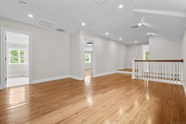 73 Nedobity Rd, Haddam, CT 06441 - spare room with light wood-type flooring, plenty of natural light, baseboards, vaulted ceiling, and recessed lighting