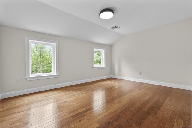 73 Nedobity Rd, Haddam, CT 06441 - unfurnished room featuring wood finished floors, vaulted ceiling, and baseboards