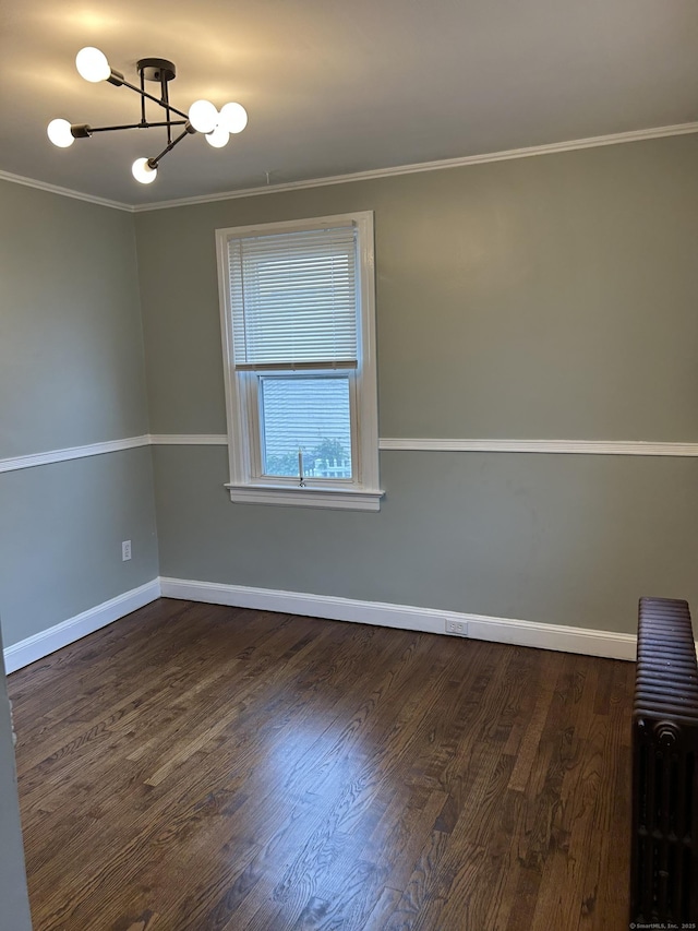 146 Knowlton St, Stratford, CT 06615 - empty room featuring radiator heating unit, a chandelier, baseboards, wood finished floors, and ornamental molding