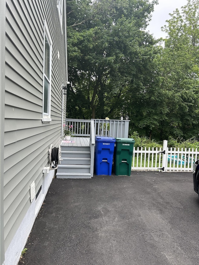 146 Knowlton St, Stratford, CT 06615 - view of patio featuring a wooden deck and view of wooded area