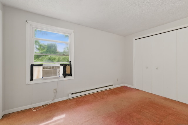 23 Fenwick Ct, Groton, CT 06355 - unfurnished bedroom featuring a baseboard heating unit, carpet floors, baseboards, and a textured ceiling