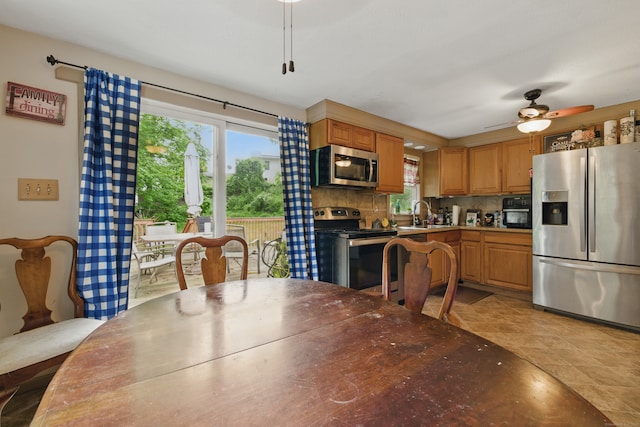 23 Fenwick Ct, Groton, CT 06355 - dining room with healthy amount of natural light and a ceiling fan