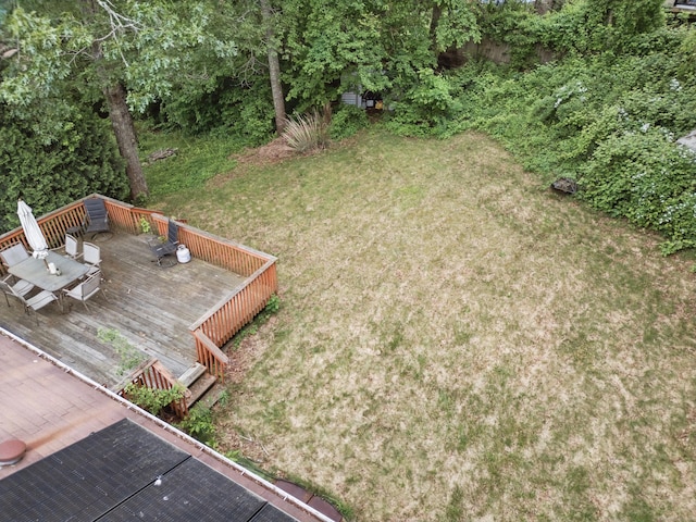 23 Fenwick Ct, Groton, CT 06355 - view of green lawn with a deck and outdoor dining area