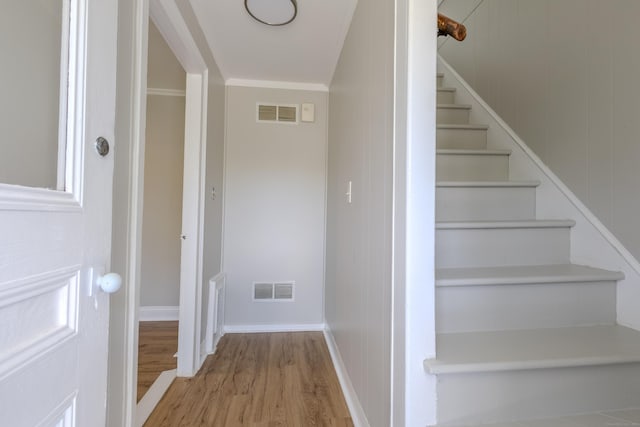 36 Broad St, Meriden, CT 06450 - stairway featuring wood finished floors and baseboards