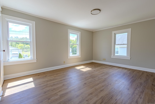 36 Broad St, Meriden, CT 06450 - spare room with ornamental molding, wood finished floors, and baseboards