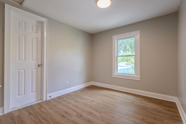 36 Broad St, Meriden, CT 06450 - empty room with light wood-style flooring and baseboards