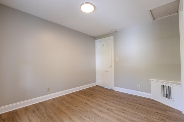 36 Broad St, Meriden, CT 06450 - spare room featuring light wood-style floors, baseboards, and a smoke detector