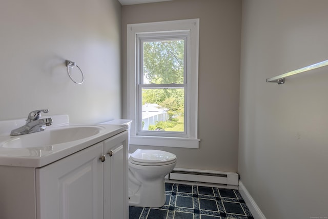 36 Broad St, Meriden, CT 06450 - bathroom with a baseboard radiator, toilet, vanity, and baseboards