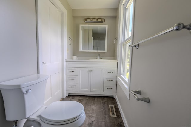 36 Broad St, Meriden, CT 06450 - bathroom with toilet, vanity, and wood finished floors