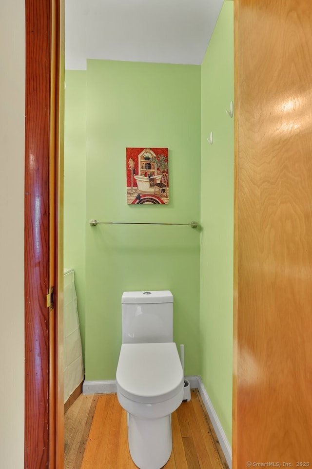 38 Craig Ave, Southington, CT 06489 - bathroom featuring wood finished floors, baseboards, and toilet