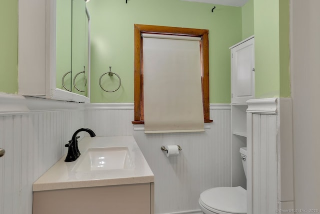 38 Craig Ave, Southington, CT 06489 - half bath with wainscoting, toilet, and vanity